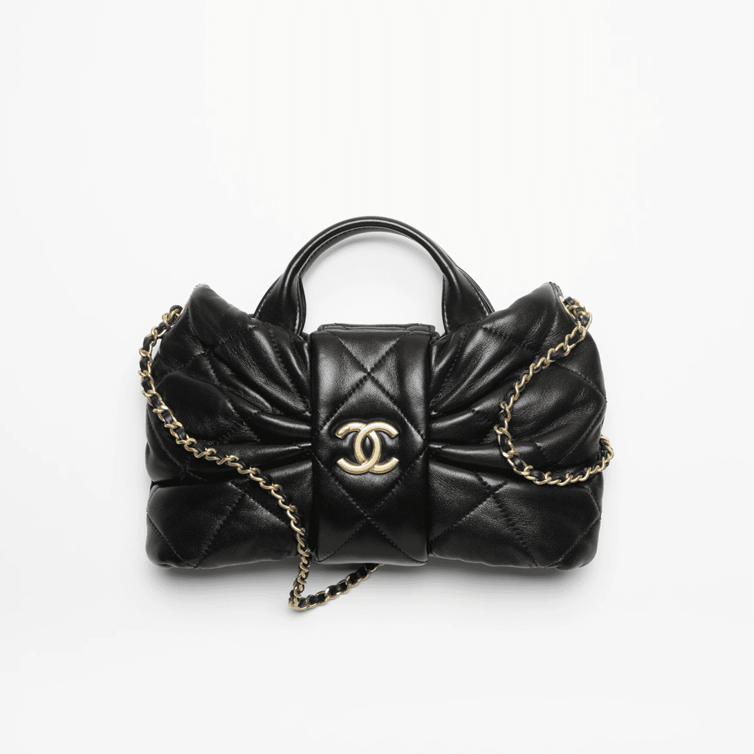 0b86ed25a745ff92b0a6a5501d253724 Chanel Mini Bow Bag - Image 1
