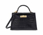 Hermès A SHINY BLACK ALLIGATOR SELLIER MINI KELLY 20 II WITH GOLD HARDWARE