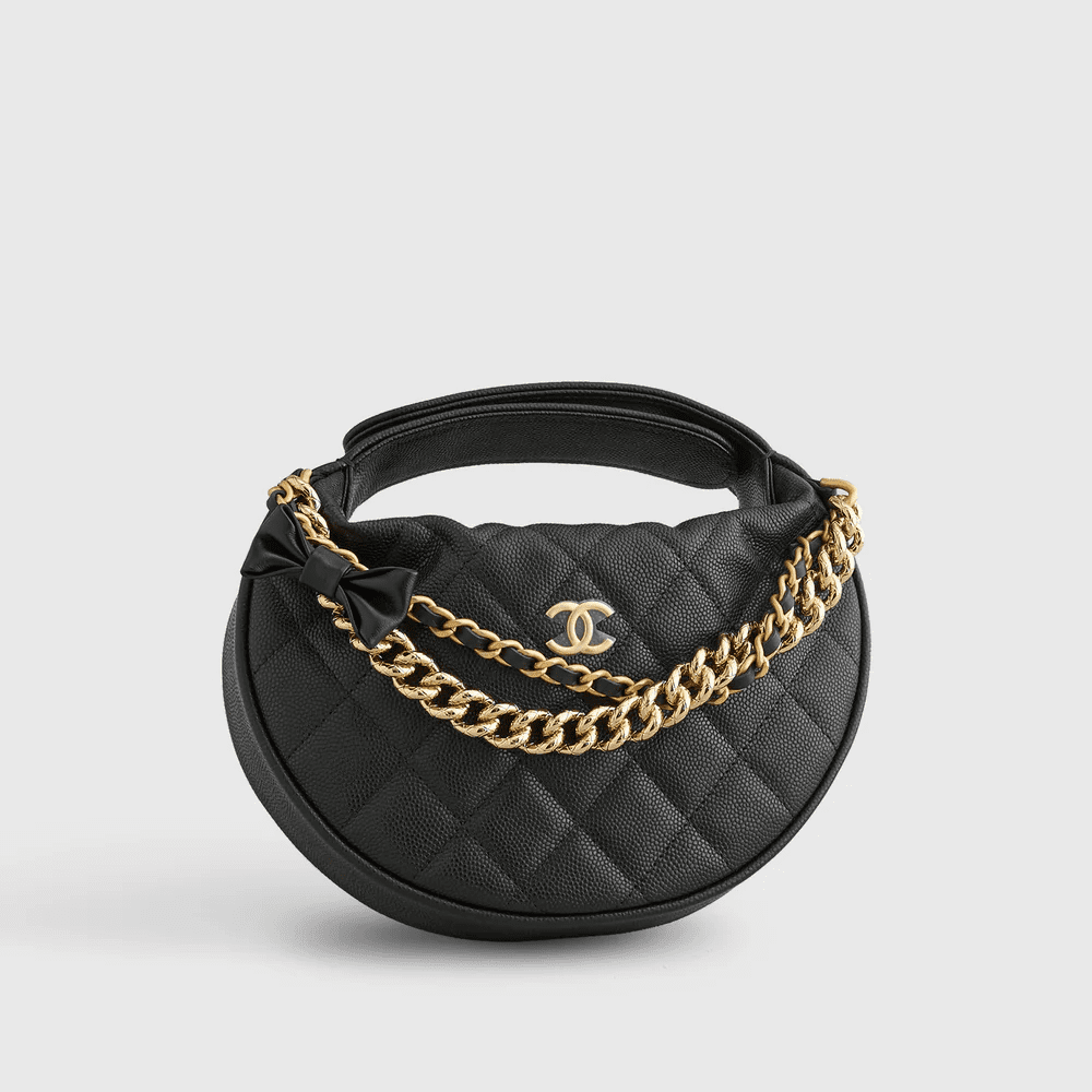 4fe51b9f92ffdc60a2354fca2b4f2249 Chanel Quilted Circle Pouch Bag - Image 1