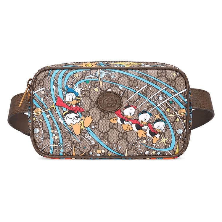 5646792b7b5efa0c0fdef95d437af95 GUCCI Disney x Gucci Donald Duck Print Belt Bag - Image 1
