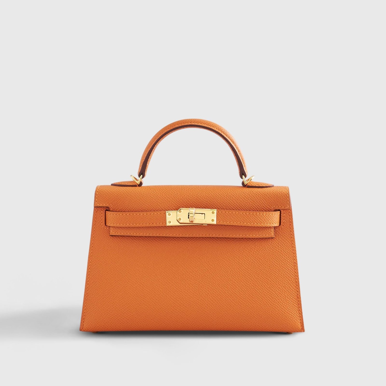 NxSwWDcC-182HermesKellyMiniEpsomOrangeGoldHardware Hermès Kelly Mini Epsom Orange Gold Hardware - Image 1