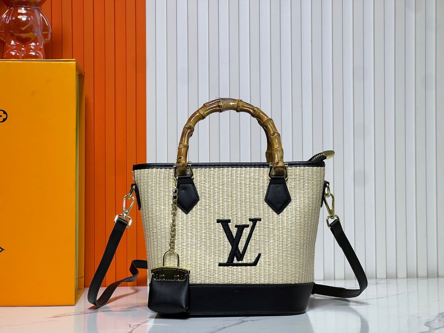 a5c74d9b2f91da70e5b03da2a504f15a Louis Vuitton Raffia Petit Bucket Tote - Image 1