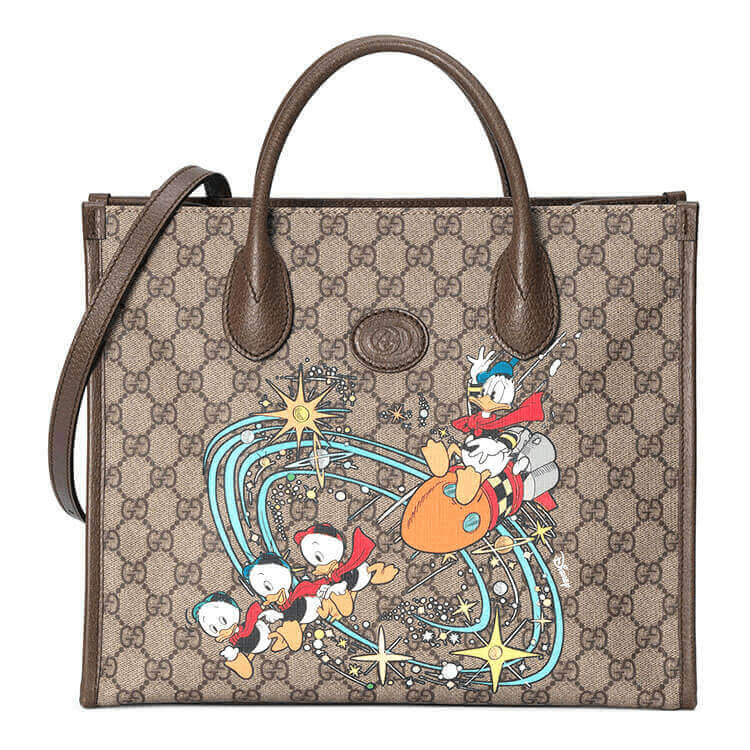 b2c3c86767b56334c1194a75a16acfe GUCCI Disney x Gucci Donald Duck Tote Bag - Image 1