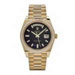Rolex Day-Date 40 228398TBR Yellow Gold Onyx Baguette Diamond Dial Baguette Bezel (2023)