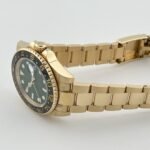 Rolex GMT-Master II 116718LN Yellow Gold Green Dial Black Bezel (2006) - Image 7