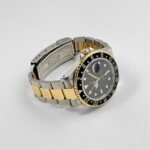 Rolex GMT-Master II 16713 Stainless Steel Yellow Gold Black Dial (1997) - Image 4
